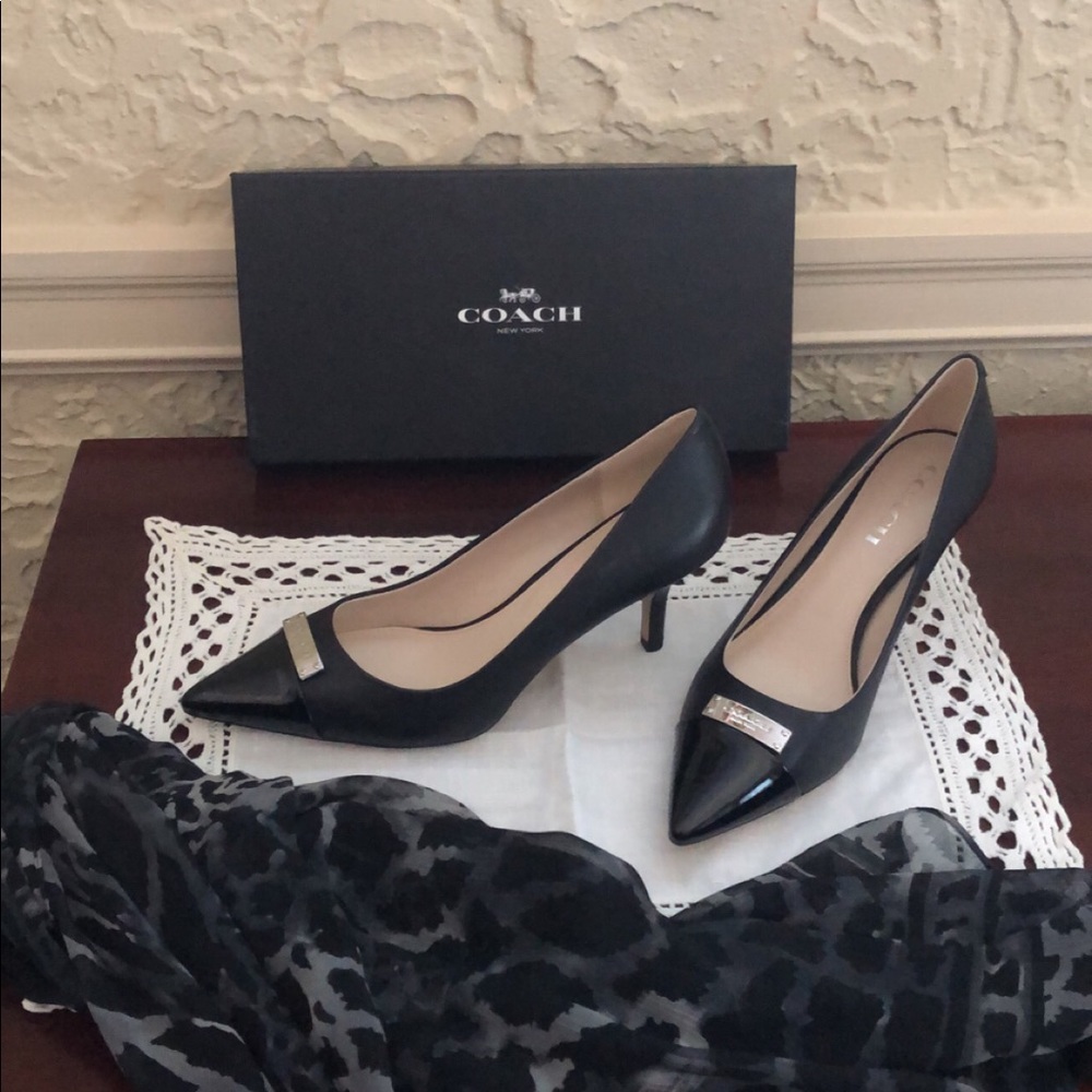 Slightly worn black coach heels